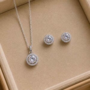 Sets de Cadenas con Dijes y Aretes